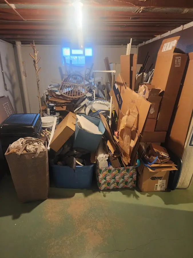 Roll-off dumpster container at job site for Construction Dumpster Rental in Warrington